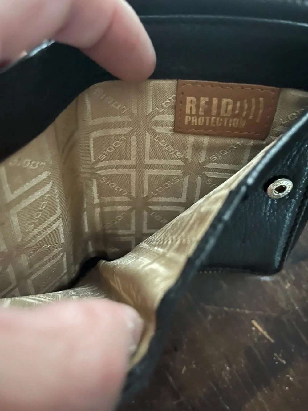 Lodis Black Pebble Leather Zip Card Holder with Gold Accents